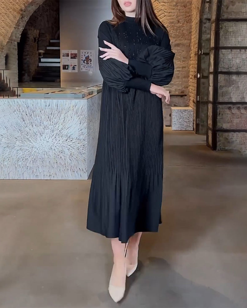 Vestito Wanda brillante con maniche a lanterna ✨🖤